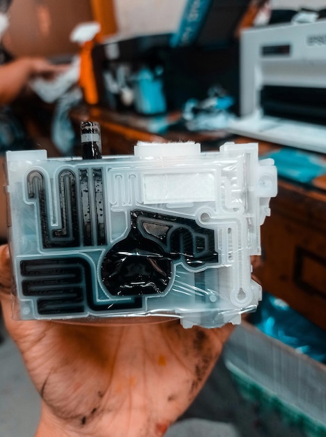 A step-by-step visual guide showing the process of covering electrical components in the engine bay with plastic bags for protection during detailing.