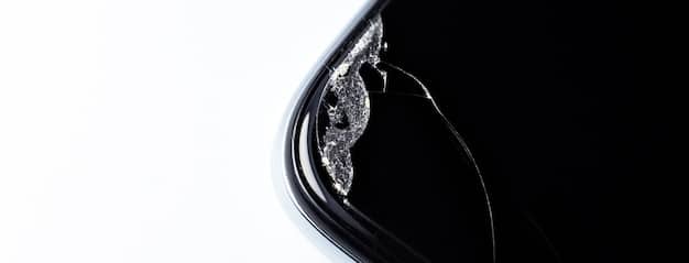 Close-up shot of water beading tightly on a car's hood after ceramic coating application, highlighting the hydrophobic effect and superior water repellency. The focus is on the clean, glossy surface and the clearly defined water beads.