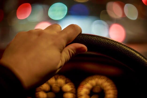 A driver's hands tightly gripping the steering wheel of a car, with eyes focused intently on the road ahead; the car is equipped with multiple advanced driver-assistance systems (ADAS), indicated by illuminated icons on the dashboard