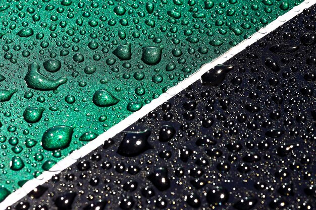 A side-by-side comparison showing water beading differently on a waxed car surface (larger, less defined beads) versus a ceramic-coated surface (tight, uniform beads). This illustrates the superior hydrophobic properties of ceramic coatings.