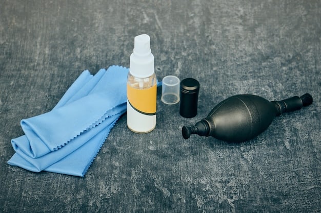 A collection of auto detailing products laid out on a clean surface, including a pH-neutral car wash soap, microfiber towels, a clay bar kit, detailing spray, and a dual-action polisher with various polishing pads.