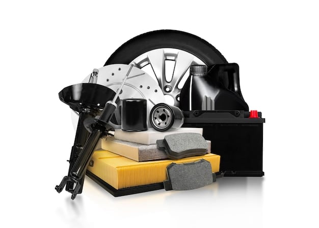 A variety of detailing products arranged neatly on a workbench, including wheel cleaner, tire shine, detailing brushes of different sizes, microfiber cloths, and a spray bottle. The products are brightly lit and professionally presented, emphasizing the range of tools and chemicals required for car detailing.