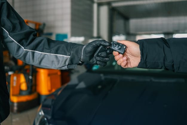 A mechanic wearing gloves carefully installing a new car battery into a vehicle engine bay. Proper tools are being used, and the surroundings are clean and organized. The background suggests an automotive service center.