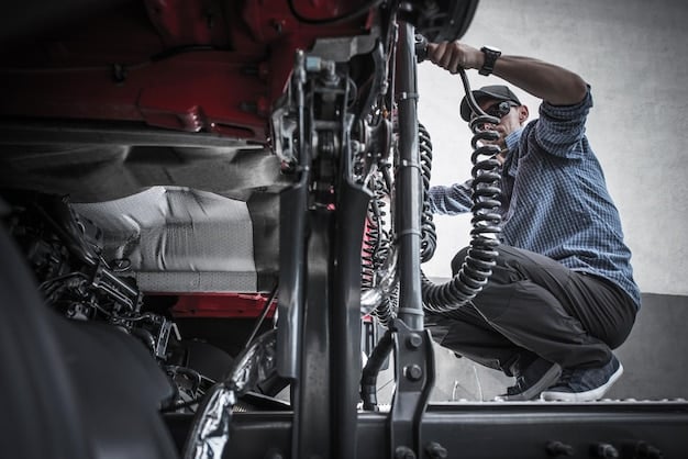 A close-up of a vehicle's suspension system while it is being adjusted by a mechanic. The mechanic is using specialized tools to precisely align the wheels, highlighting the technical aspect of the Get Road Trip Ready: Receive a $20 Discount on Alignment Services Before Your Next Long Drive offer.