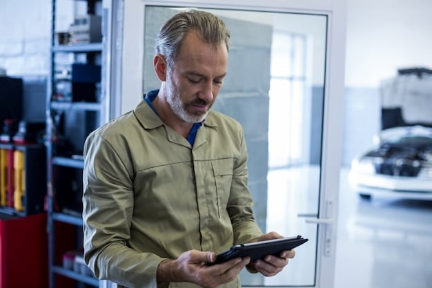 A mechanic showing a customer the diagnostic report on a tablet, explaining the findings. The mechanic is pointing to specific sections of the report, and the customer appears engaged and understanding. Highlight the communication between the mechanic and the customer. 'Ensure Peak Performance: Get a Free Diagnostic Scan with Any Scheduled Service in December' context.