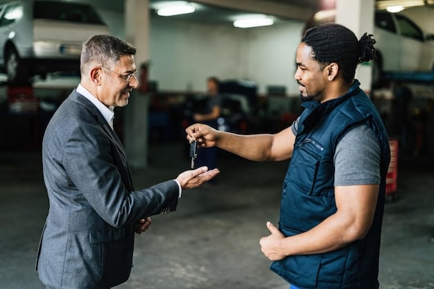 A friendly service advisor handing car keys back to a smiling customer in a well-lit dealership service reception area. The scene conveys trust and satisfaction, reinforcing the positive experience associated with the 'Exclusive Offer: Get a Free Car Wash with Any Service Exceeding $100 This Quarter.'