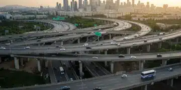 Autonomous vehicles driving on a modern highway, symbolizing economic future